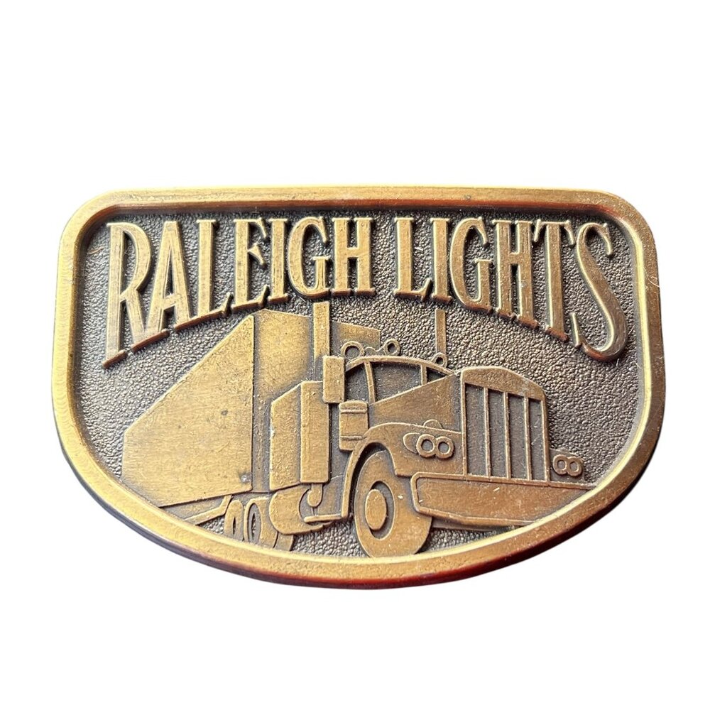 Vintage Raleigh Lights Cigarettes Semi Truck Belt Buckle Tractor Trailer Rig 70s